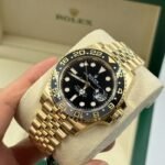 Rolex GMT Master ll Yellow Gold Black Dial Jubilee Bracelet Men's Watch 40mm M126718GRNR-0001 - Image 9